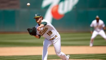 OAKLAND, CA - April 17: Cole Irvin #19 of the Oakland Athletics pitches during the game against the Detroit Tigers at RingCentral Coliseum on April 17, 2021 in Oakland, California. The Athletics defeated the Tigers 7-0. (Photo by Michael Zagaris/Oakland Athletics/Getty Images)