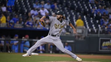 KANSAS CITY, MO - SEPTEMBER 15: Dillon Overton #47 of the Oakland Athletics throws against the Kansas City Royals at Kauffman Stadium on September 15, 2016 in Kansas City, Missouri. (Photo by Ed Zurga/Getty Images)