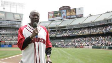OAKLAND, CA - MAY 30: "Black Aces" Jim "Mudcat" Grant sings the national anthem before the game between the Oakland Athletics and the Texas Rangers at the McAfee Coliseum in Oakland, California on May 30, 2007. The Athletics defeated the Rangers 6-1. (Photo by Michael Zagaris/MLB Photos via Getty Images)