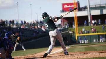 MESA, AZ - FEBRUARY 28: Greg Deichmann of the Oakland Athletics hits a home run during the game against the Chicago Cubs at Sloan Park on February 28, 2018 in Mesa, Arizona. (Photo by Michael Zagaris/Oakland Athletics/Getty Images) *** Local Caption *** Greg Deichmann