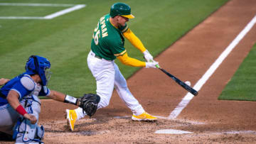 May 5, 2021; Oakland, California, USA; Oakland Athletics third baseman Matt Chapman (26) hits a solo home run during the fourth inning against the Toronto Blue Jays at RingCentral Coliseum. Mandatory Credit: Neville E. Guard-USA TODAY Sports