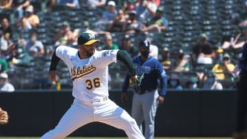 May 8, 2021; Oakland, California, USA; Oakland Athletics relief pitcher Yusmeiro Petit (36) pitches the ball against the Tampa Bay Rays during the sixth inning at RingCentral Coliseum. Mandatory Credit: Kelley L Cox-USA TODAY Sports