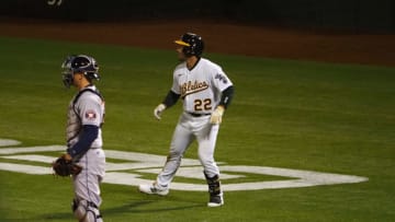 May 18, 2021; Oakland, California, USA; Oakland Athletics center fielder Ramon Laureano (22) follows his hit as he hits a sacrifice fly to send in a run for a walk-off win against the Houston Astros during the ninth inning at RingCentral Coliseum. Mandatory Credit: Kelley L Cox-USA TODAY Sports