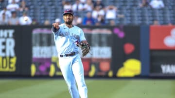 May 27, 2021; Bronx, New York, USA; Toronto Blue Jays second baseman Marcus Semien (10) throws to first for the final out of the game against the New York Yankees at Yankee Stadium. Mandatory Credit: Wendell Cruz-USA TODAY Sports