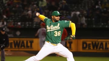 May 28, 2021; Oakland, California, USA; Oakland Athletics relief pitcher Yusmeiro Petit (36) pitches against the Los Angeles Angels during the eighth inning at RingCentral Coliseum. Mandatory Credit: Kelley L Cox-USA TODAY Sports