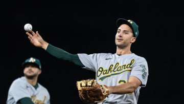 Sep 27, 2021; Seattle, Washington, USA; Oakland Athletics first baseman Matt Olson (28) throws the ball around before a game against the Seattle Mariners at T-Mobile Park. The Mariners won 13-4. Mandatory Credit: Stephen Brashear-USA TODAY Sports