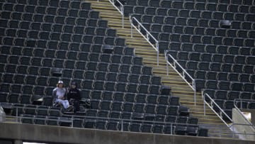 May 2, 2022; Oakland, California, USA; Two Oakland Athletics fans have the upper deck to themselves during the eighth inning of a game between the A’s and the Tampa Bay Rays at RingCentral Coliseum. The announced attendance for the game was 2,488. Mandatory Credit: D. Ross Cameron-USA TODAY Sports