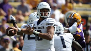 BATON ROUGE, LOUISIANA - OCTOBER 05: Quarterback Jordan Love #10 of the Utah State Aggies looks to throw a pass against the LSU Tigers at Tiger Stadium on October 05, 2019 in Baton Rouge, Louisiana. (Photo by Chris Graythen/Getty Images)