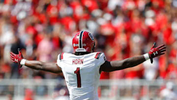 ATHENS, GEORGIA - OCTOBER 12: Jaycee Horn #1 of the South Carolina Gamecocks reacts as Israel Mukuamu #24 returns an interception for a touchdown in the first half against the Georgia Bulldogs at Sanford Stadium on October 12, 2019 in Athens, Georgia. (Photo by Kevin C. Cox/Getty Images)
