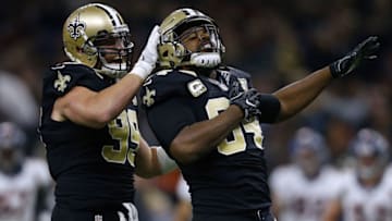 NEW ORLEANS, LA - NOVEMBER 13: Cameron Jordan #94 of the New Orleans Saints celebrates a sack with Paul Kruger #99 during the first half of a game against the Denver Broncos at the Mercedes-Benz Superdome on November 13, 2016 in New Orleans, Louisiana. (Photo by Jonathan Bachman/Getty Images)