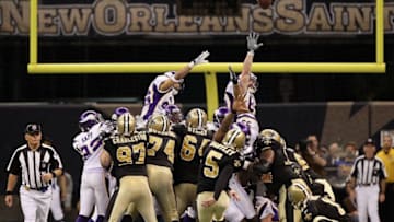 NEW ORLEANS - JANUARY 24: Kicker Garrett Hartley #5 of the New Orleans Saints kicks a game winning field goal in overtime against the Minnesota Vikings to win the NFC Championship Game at the Louisiana Superdome on January 24, 2010 in New Orleans, Louisiana. (Photo by Jed Jacobsohn/Getty Images)