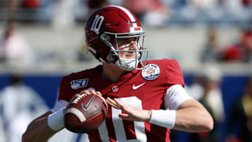 ORLANDO, FL - JANUARY 01: Mac Jones #10 of the Alabama Crimson Tide warms up prior to the Vrbo Citrus Bowl against the Michigan Wolverines at Camping World Stadium on January 1, 2020 in Orlando, Florida. (Photo by Joe Robbins/Getty Images)