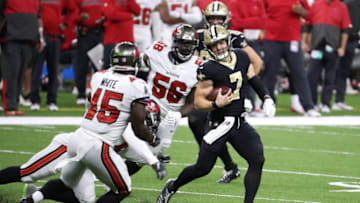 NEW ORLEANS, LOUISIANA - SEPTEMBER 13: Taysom Hill #7 of the New Orleans Saints runs against the Tampa Bay Buccaneers during the second quarter at the Mercedes-Benz Superdome on September 13, 2020 in New Orleans, Louisiana. (Photo by Chris Graythen/Getty Images)