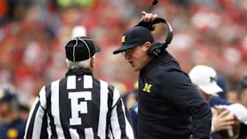 COLUMBUS, OH - NOVEMBER 26: Head coach Jim Harbaugh of the Michigan Wolverines argues a call on the sideline during the first half against the Ohio State Buckeyes at Ohio Stadium on November 26, 2016 in Columbus, Ohio. (Photo by Gregory Shamus/Getty Images)