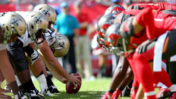 TAMPA, FL - DECEMBER 13: New Orleans Saints and Tampa Bay Buccaneers players line up before the ball is snapped during the first half of the game at Raymond James Stadium on December 13, 2015 in Tampa, Florida. (Photo by Rob Foldy/Getty Images)