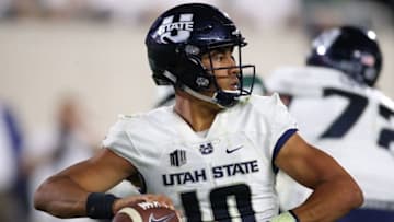 EAST LANSING, MI - AUGUST 31: Jordan Love #10 of the Utah State Aggies throws a second half pass while playing the Michigan State Spartans at Spartan Stadium on August 31, 2018 in East Lansing, Michigan. Michigan State won the game 38-31. (Photo by Gregory Shamus/Getty Images)