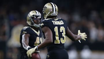 NEW ORLEANS, LA - SEPTEMBER 16: Michael Thomas #13 of the New Orleans Saints celebrates with Alvin Kamara #41 of the New Orleans Saints after scoring a tochdown during the fourth quarter against the Cleveland Browns at Mercedes-Benz Superdome on September 16, 2018 in New Orleans, Louisiana. (Photo by Sean Gardner/Getty Images)