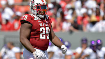 RALEIGH, NORTH CAROLINA - AUGUST 31: Alim McNeill #29 of the North Carolina State Wolfpack against the East Carolina Pirates during their game at Carter-Finley Stadium on August 31, 2019 in Raleigh, North Carolina. (Photo by Grant Halverson/Getty Images)