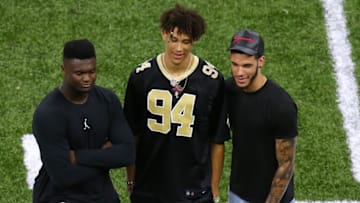NEW ORLEANS, LOUISIANA - SEPTEMBER 09: Zion Williamson, Jaxson Hayes and Lonzo Ball of the New Orleans Pelicans react during a game between the New Orleans Saints and the Houston Texans at the Mercedes Benz Superdome on September 09, 2019 in New Orleans, Louisiana. (Photo by Jonathan Bachman/Getty Images)