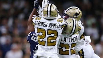 NEW ORLEANS, LOUISIANA - SEPTEMBER 29: Chauncey Gardner-Johnson #22 of the New Orleans Saints, Marcus Williams #43 and Marshon Lattimore #23 breaks up a pass intended for Amari Cooper #19 of the Dallas Cowboys during the second half of a game at the Mercedes Benz Superdome on September 29, 2019 in New Orleans, Louisiana. (Photo by Jonathan Bachman/Getty Images)