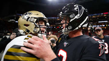 ATLANTA, GA - NOVEMBER 28: Drew Brees #9 of the New Orleans Saints speaks with Matt Ryan #2 of the Atlanta Falcons following an NFL game at Mercedes-Benz Stadium on November 28, 2019 in Atlanta, Georgia. (Photo by Todd Kirkland/Getty Images)