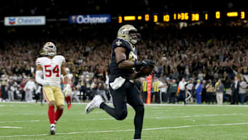 NEW ORLEANS, LOUISIANA - DECEMBER 08: Jared Cook #87 of the New Orleans Saints celebrates as he scores a 38 yard touchdown against the San Francisco 49ers during the first quarter in the game at Mercedes Benz Superdome on December 08, 2019 in New Orleans, Louisiana. (Photo by Jonathan Bachman/Getty Images)