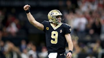 NEW ORLEANS, LOUISIANA - DECEMBER 08: Drew Brees #9 of the New Orleans Saints reacts after throwing a touchdown pass during a NFL game against the San Francisco 49ers at the Mercedes Benz Superdome on December 08, 2019 in New Orleans, Louisiana. (Photo by Sean Gardner/Getty Images)