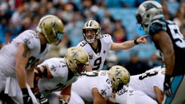 CHARLOTTE, NORTH CAROLINA - DECEMBER 29: Drew Brees #9 of the New Orleans Saints directs players before the snap during the first quarter during their game against the Carolina Panthers at Bank of America Stadium on December 29, 2019 in Charlotte, North Carolina. (Photo by Jacob Kupferman/Getty Images)