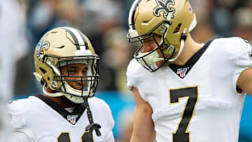 NASHVILLE, TN - DECEMBER 22: Deonte Harris #11 and Taysom Hill #7 of the New Orleans Saints warms up before a game against the Tennessee Titans at Nissan Stadium on December 22, 2019 in Nashville, Tennessee. The Saints defeated the Titans 38-28. (Photo by Wesley Hitt/Getty Images)