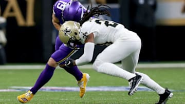 NEW ORLEANS, LOUISIANA - JANUARY 05: Janoris Jenkins #20 of the New Orleans Saints forces a fumble on Adam Thielen #19 of the Minnesota Vikings in the NFC Wild Card Playoff game at Mercedes Benz Superdome on January 05, 2020 in New Orleans, Louisiana. (Photo by Sean Gardner/Getty Images)