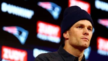FOXBOROUGH, MASSACHUSETTS - JANUARY 04: Tom Brady #12 of the New England Patriots speaks with the media during a press conference after being defeated by the Tennessee Titans 20-13 in the AFC Wild Card Playoff game at Gillette Stadium on January 04, 2020 in Foxborough, Massachusetts. (Photo by Adam Glanzman/Getty Images)