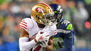 SEATTLE, WASHINGTON - DECEMBER 29: Emmanuel Sanders #17 of the San Francisco 49ers catches a pass against Bradley McDougald #30 of the Seattle Seahawks during the first quarter of the game at CenturyLink Field on December 29, 2019 in Seattle, Washington. The San Francisco 49ers top the Seattle Seahawks 26-21. (Photo by Alika Jenner/Getty Images)
