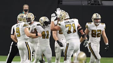 LAS VEGAS, NEVADA - SEPTEMBER 21: Alvin Kamara #41 of the New Orleans Saints celebrates with Drew Brees #9 and Ryan Ramczyk #71 after scoring a touchdown during the first quarter against the Las Vegas Raiders at Allegiant Stadium on September 21, 2020 in Las Vegas, Nevada. (Photo by Christian Petersen/Getty Images)