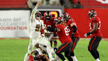 TAMPA, FLORIDA - NOVEMBER 08: Trey Hendrickson #91 and Cameron Jordan #94 of the New Orleans Saints celebrate sacking Tom Brady #12 of the Tampa Bay Buccaneers during the third quarter at Raymond James Stadium on November 08, 2020 in Tampa, Florida. (Photo by Mike Ehrmann/Getty Images)