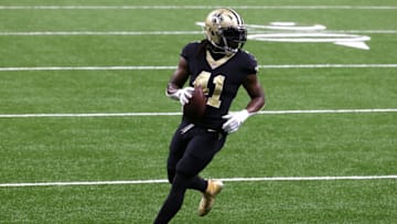 NEW ORLEANS, LOUISIANA - NOVEMBER 15: Alvin Kamara #41 of the New Orleans Saints carries the ball in for a touchdown during their game against the San Francisco 49ers at Mercedes-Benz Superdome on November 15, 2020 in New Orleans, Louisiana. (Photo by Chris Graythen/Getty Images)