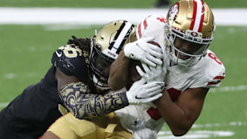 NEW ORLEANS, LOUISIANA - NOVEMBER 15: Kendrick Bourne #84 of the San Francisco 49ers catches a pass against Demario Davis #56 of the New Orleans Saints during their game at Mercedes-Benz Superdome on November 15, 2020 in New Orleans, Louisiana. (Photo by Chris Graythen/Getty Images)