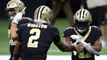 NEW ORLEANS, LOUISIANA - NOVEMBER 15: Alvin Kamara #41 and Jameis Winston #2 of the New Orleans Saints celebrate following a touchdown during their game against the San Francisco 49ers at Mercedes-Benz Superdome on November 15, 2020 in New Orleans, Louisiana. (Photo by Chris Graythen/Getty Images)