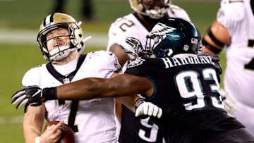 PHILADELPHIA, PENNSYLVANIA - DECEMBER 13: Nose tackle Javon Hargrave #93 of the Philadelphia Eagles sacks quarterback Taysom Hill #7 of the New Orleans Saints in the fourth quarter at Lincoln Financial Field on December 13, 2020 in Philadelphia, Pennsylvania. (Photo by Tim Nwachukwu/Getty Images)