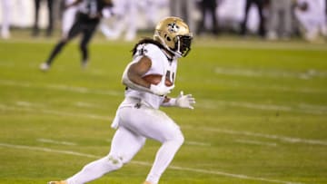 PHILADELPHIA, PA - DECEMBER 13: Alvin Kamara #41 of the New Orleans Saints runs the ball against the Philadelphia Eagles at Lincoln Financial Field on December 13, 2020 in Philadelphia, Pennsylvania. (Photo by Mitchell Leff/Getty Images)