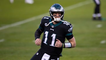PHILADELPHIA, PA - DECEMBER 13: Carson Wentz #11 of the Philadelphia Eagles warms up prior to the game against the New Orleans Saints at Lincoln Financial Field on December 13, 2020 in Philadelphia, Pennsylvania. (Photo by Mitchell Leff/Getty Images)
