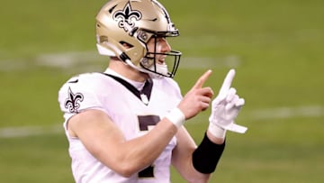 PHILADELPHIA, PENNSYLVANIA - DECEMBER 13: Taysom Hill #7 of the New Orleans Saints signals to teammates against the Philadelphia Eagles at Lincoln Financial Field on December 13, 2020 in Philadelphia, Pennsylvania. (Photo by Tim Nwachukwu/Getty Images)