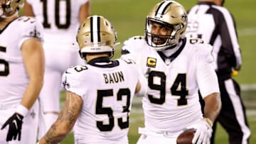 PHILADELPHIA, PENNSYLVANIA - DECEMBER 13: Cameron Jordan #94 of the New Orleans Saints celebrates a fumble recovery against the Philadelphia Eagles at Lincoln Financial Field on December 13, 2020 in Philadelphia, Pennsylvania. (Photo by Tim Nwachukwu/Getty Images)