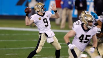 CHARLOTTE, NORTH CAROLINA - JANUARY 03: Quarterback Drew Brees #9 of the New Orleans Saints attempts a pass during the second half of their game against the Carolina Panthers at Bank of America Stadium on January 03, 2021 in Charlotte, North Carolina. (Photo by Jared C. Tilton/Getty Images)