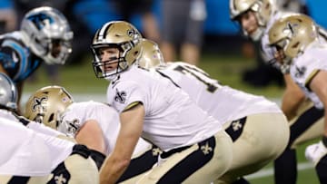 CHARLOTTE, NORTH CAROLINA - JANUARY 03: Quarterback Drew Brees #9 of the New Orleans Saints prepares to take the snap during the second half of their game against the Carolina Panthers at Bank of America Stadium on January 03, 2021 in Charlotte, North Carolina. (Photo by Jared C. Tilton/Getty Images)