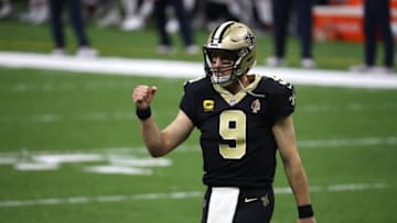 NEW ORLEANS, LOUISIANA - JANUARY 10: Drew Brees #9 of the New Orleans Saints celebrates a touchdown scored by Alvin Kamara #41 (not pictured) against the Chicago Bears during the fourth quarter in the NFC Wild Card Playoff game at Mercedes Benz Superdome on January 10, 2021 in New Orleans, Louisiana. (Photo by Chris Graythen/Getty Images)