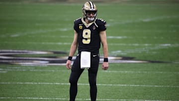 NEW ORLEANS, LOUISIANA - JANUARY 17: Drew Brees #9 of the New Orleans Saints looks on against the Tampa Bay Buccaneers during the first quarter in the NFC Divisional Playoff game at Mercedes Benz Superdome on January 17, 2021 in New Orleans, Louisiana. (Photo by Chris Graythen/Getty Images)
