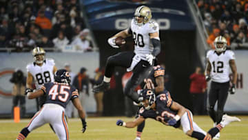 CHICAGO, IL - DECEMBER 15: Jimmy Graham #80 of the New Orleans Saints jumps over Kyle Fuller #23 of the Chicago Bears and Brock Vereen #45 of the Chicago Bears during the fourth quarter at Soldier Field on December 15, 2014 in Chicago, Illinois. (Photo by David Banks/Getty Images)