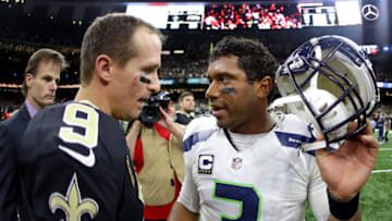 NEW ORLEANS, LA - OCTOBER 30: Drew Brees #9 of the New Orleans Saints is congratulated by Russell Wilson #3 of the Seattle Seahawks after their game at the Mercedes-Benz Superdome on October 30, 2016 in New Orleans, Louisiana. New Orleans won the game 25-20. (Photo by Sean Gardner/Getty Images)