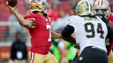 SANTA CLARA, CA - NOVEMBER 6: Quarterback Colin Kaepernick #7 of the San Francisco 49ers makes a 19-yard throw under pressure from defensive end Cameron Jordan #94 of the New Orleans Saints in the fourth quarter on November, 6 2016 at Levi's Stadium in Santa Clara, California. The Saints won 41-23. (Photo by Brian Bahr/Getty Images)
