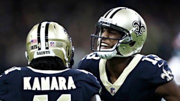 NEW ORLEANS, LA - OCTOBER 29: Alvin Kamara #41 and Michael Thomas #13 of the New Orleans Saints celebrate after a big catch by Kamara during a game against the Chicago Bears at Mercedes-Benz Superdome on October 29, 2017 in New Orleans, Louisiana. The Saints defeated the Bears 20-12. (Photo by Wesley Hitt/Getty Images)